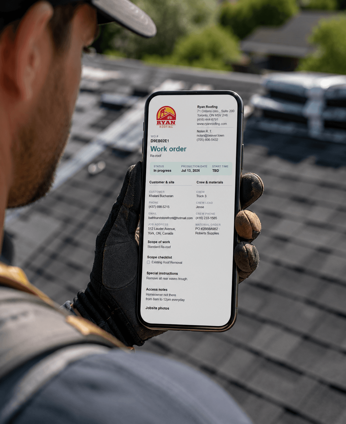 A roofer on a rooftop viewing a bundled Vertex CRM work order PDF on his phone